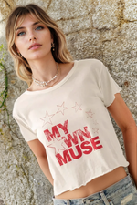 Vintage-washed 'My Own Muse' cropped graphic t-shirt with star print, lettuce-edge hem, and relaxed fit.